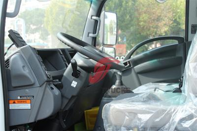 Trash compactor made by Isuzu trucks